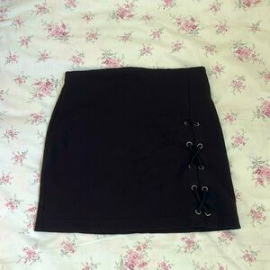 Classic, black mini skirt with a twist.